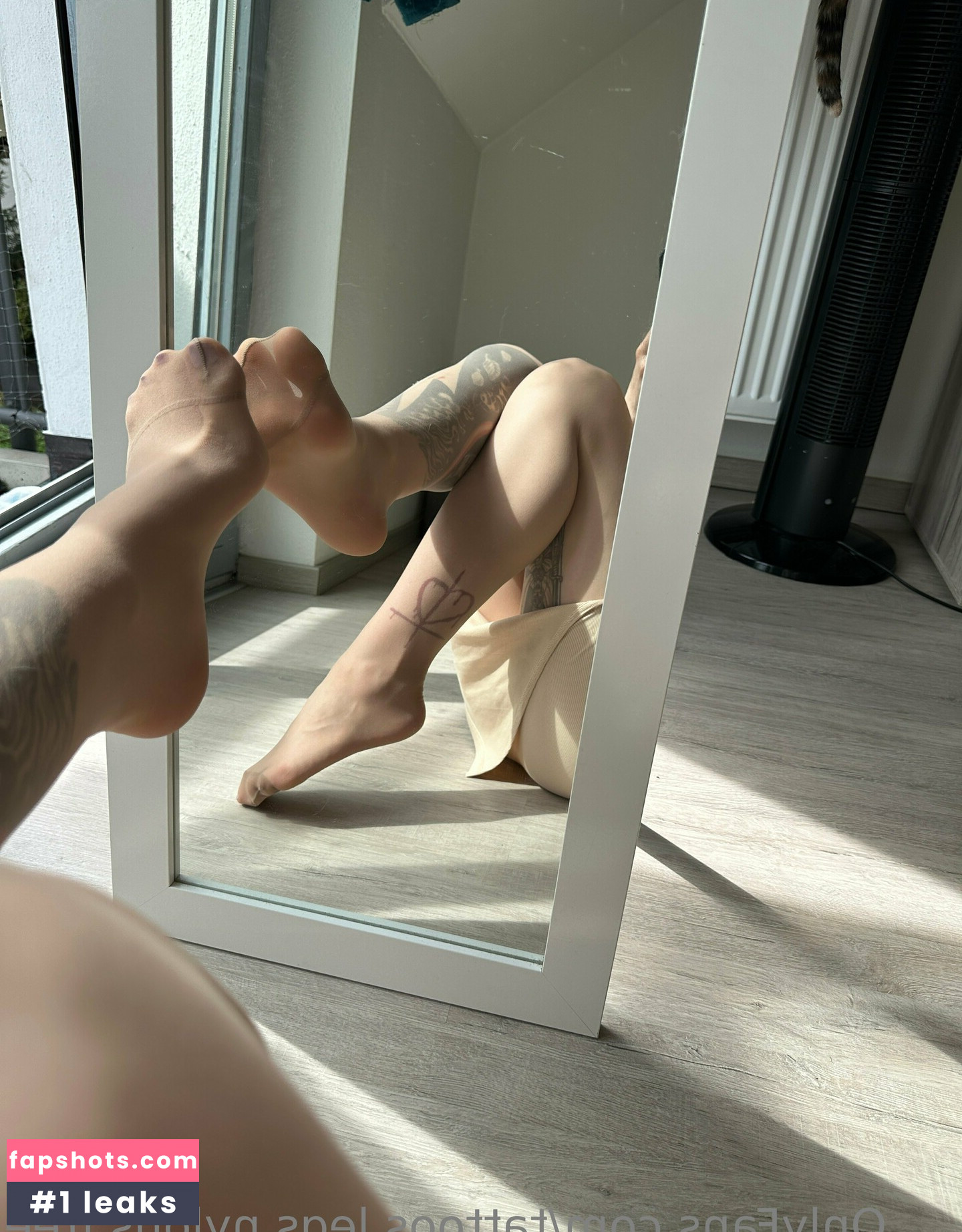 tattoos.legs.nylons.free